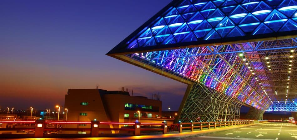 Modern structure with LED lighting at dusk